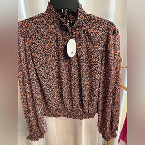 Lost and Wonder orange flower print, high neck, long sleeve top. Size Large.